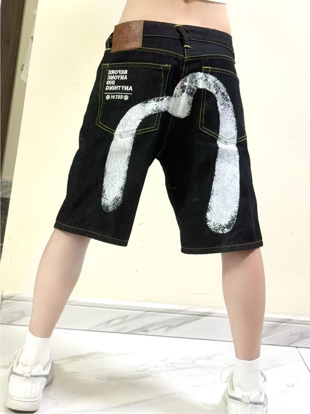 Evisu Black Denim Shorts with White Paint Graphic
